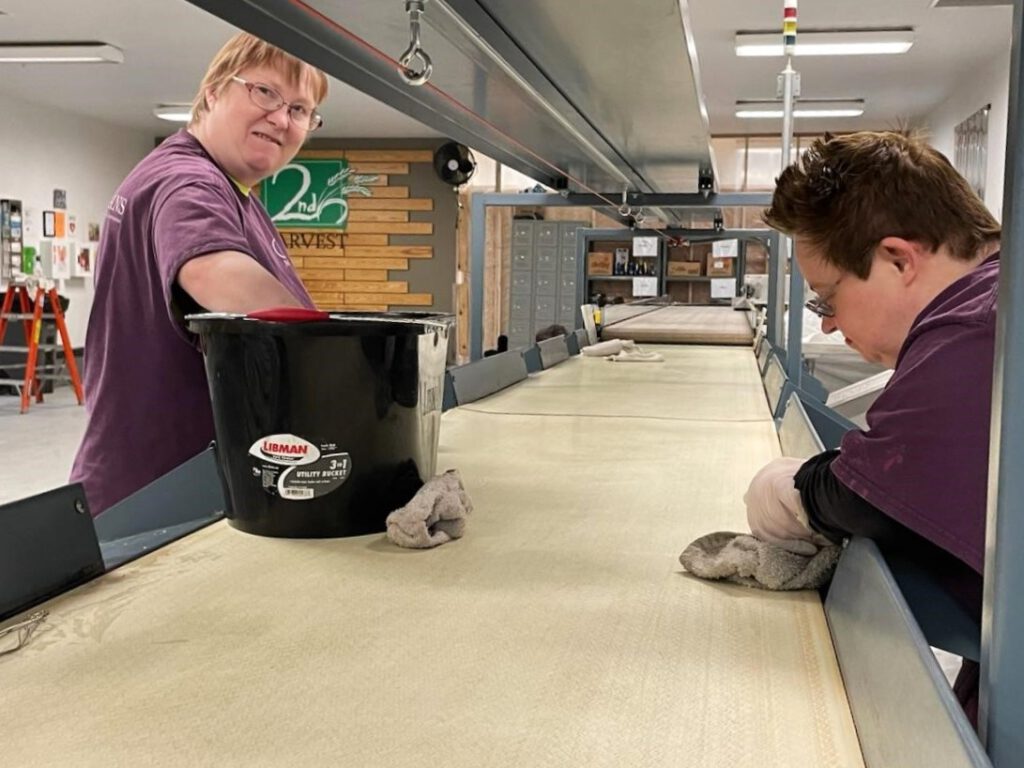 Artisans help clean in the volunteer center