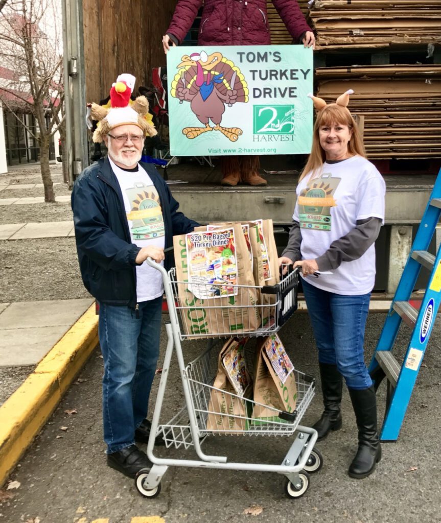 Dan and Julie volunteering for Tom's Turkey Drive