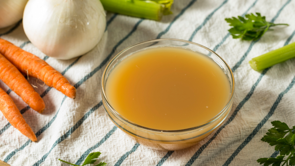 Vegetable broth alongside ingredients