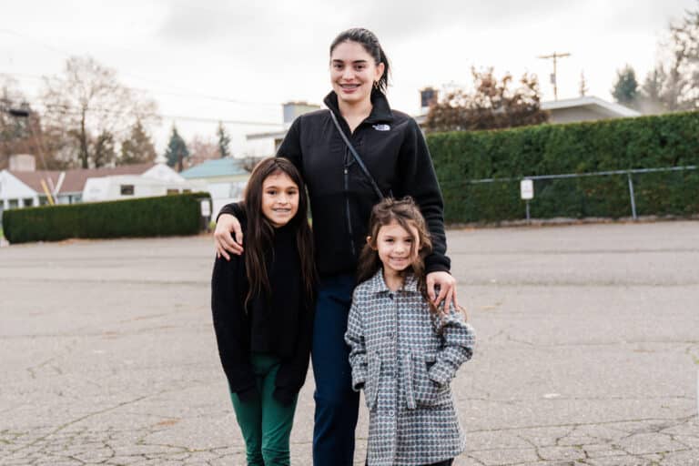 Norissa and her children at a Tom's Turkey Drive distribution