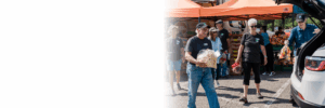 Volunteers distribute food at a Mobile Market