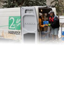 Unloading food from a Second Harvest van in the winter