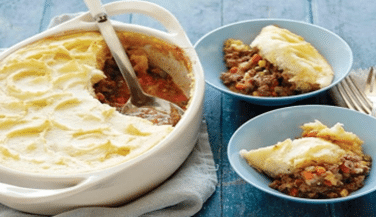 Cottage Pie being served into dishes