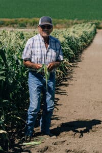 Fred holding corn