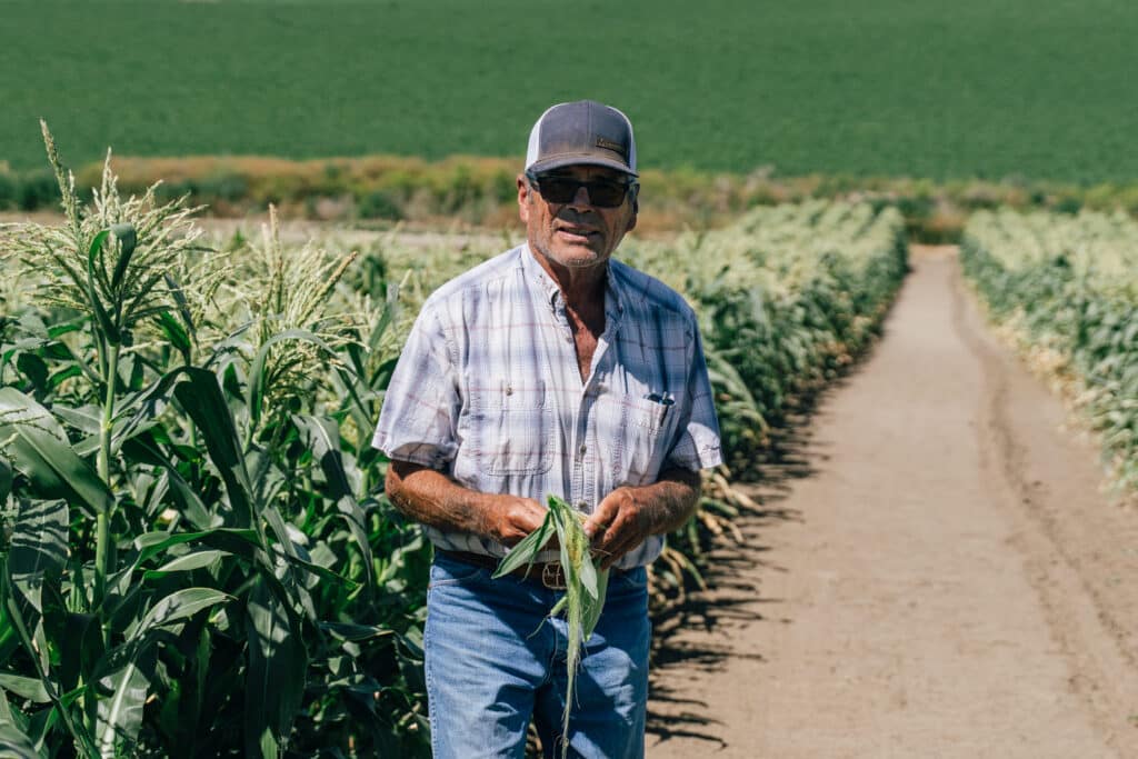 Fred holding corn