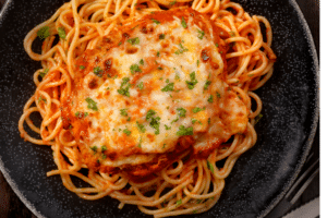 Chickpea Parmesan with pasta on a plate